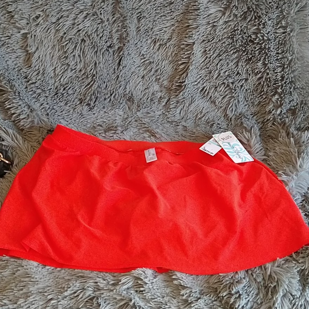 New with tags, skirt swim bottoms. Orange one sold. Black available.